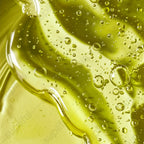 Close-up of yellow liquid with bubbles