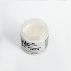 Jar of recovery cream with visible brand label on a white background