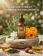 Nestdeer hair growth product with natural elements on a stone surface